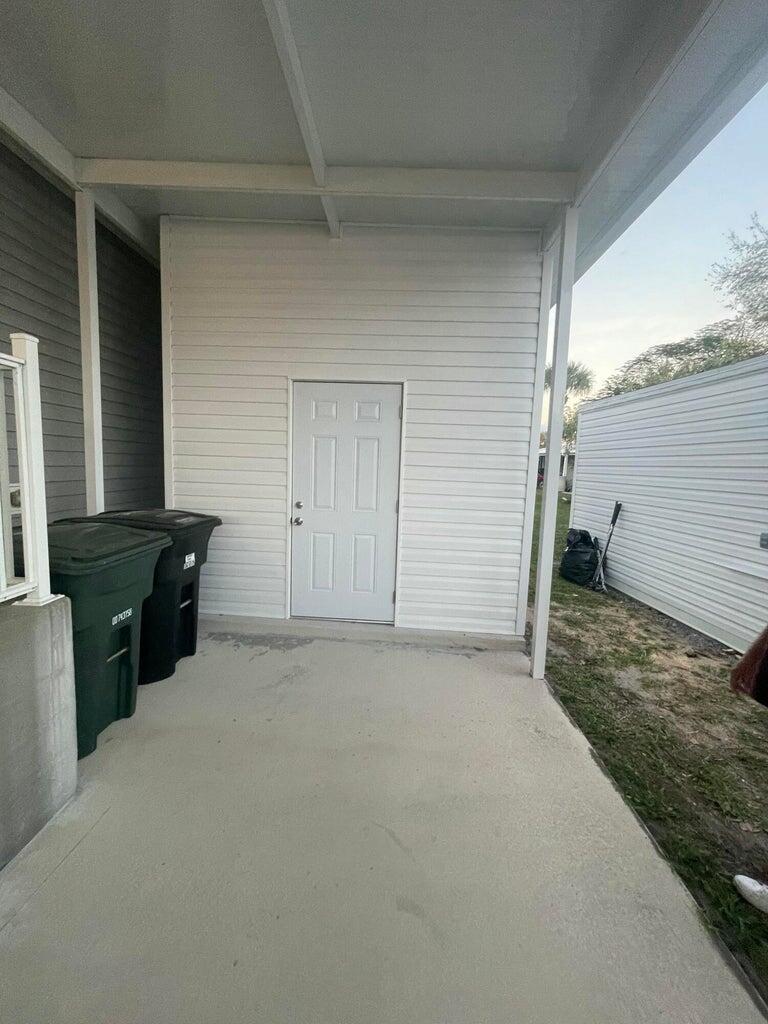 356 Mockingbird Avenue Fort Pierce, FL 34982 - Photo 8 of 12 a view of a storage & utility room