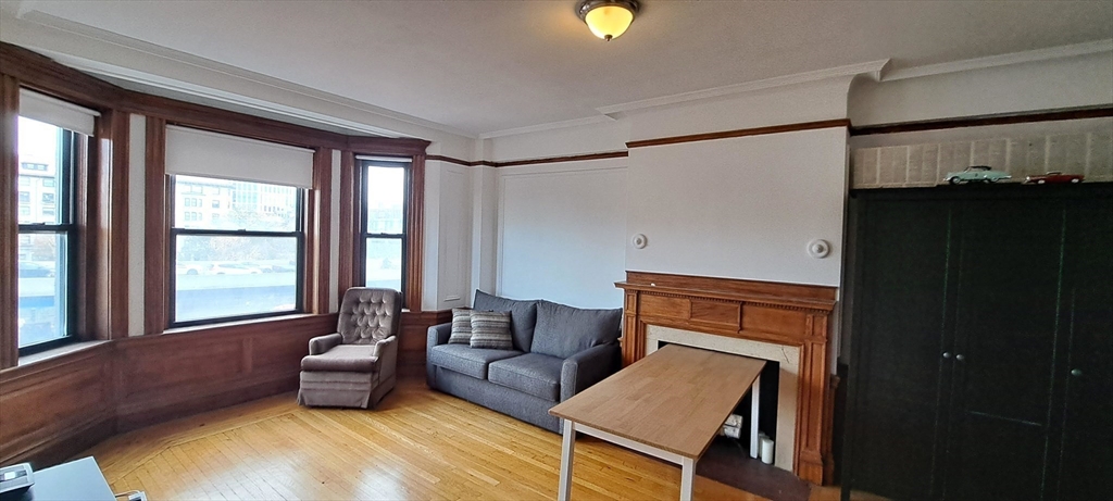 464 Commonwealth Avenue, Unit 44 Boston, MA 02215 - Photo 5 of 15 a living room with furniture and a window