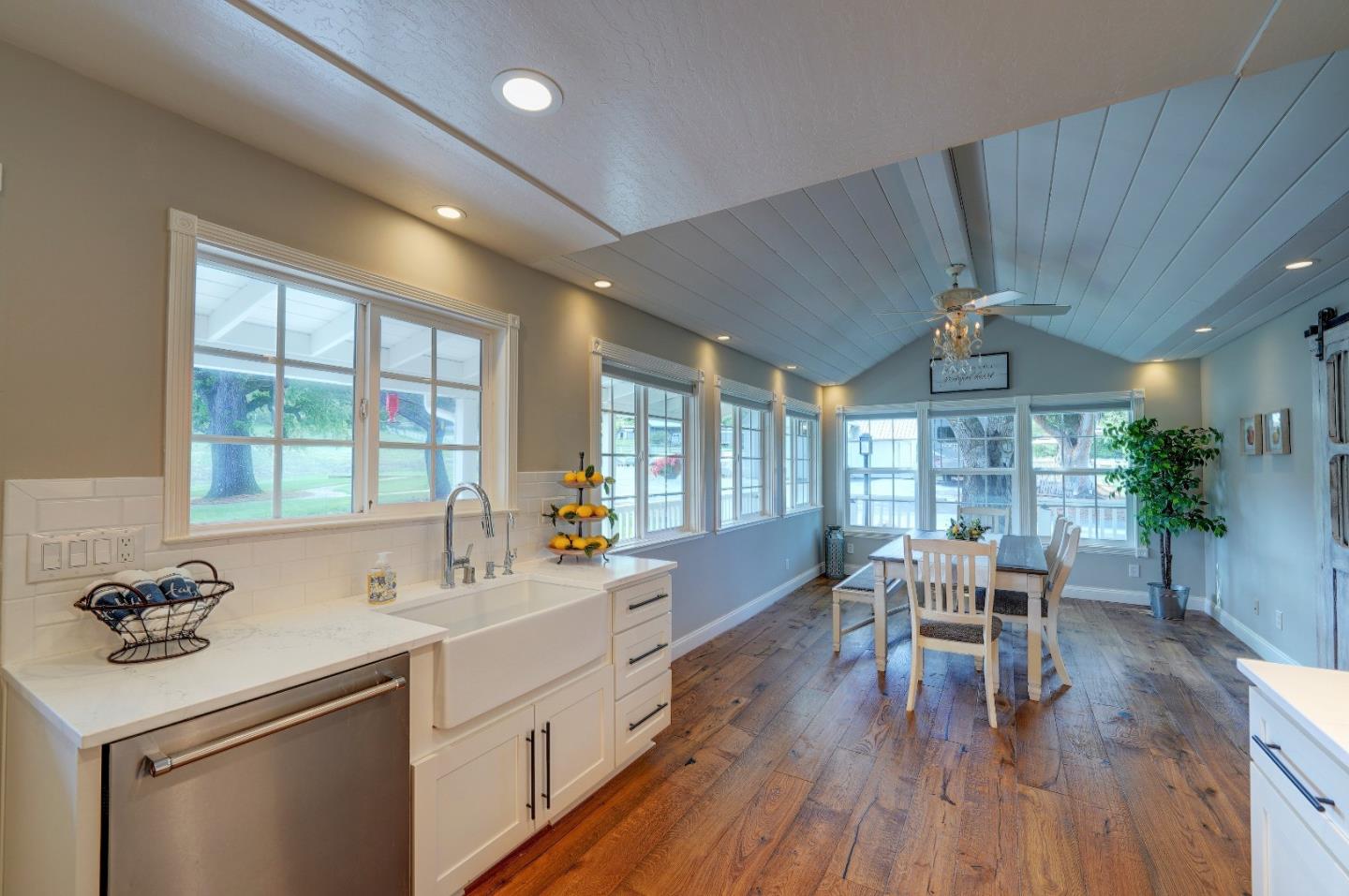8495 Pharmer Road Gilroy, CA 95020 - Photo 13 of 70 a kitchen with a table chairs stove and sink