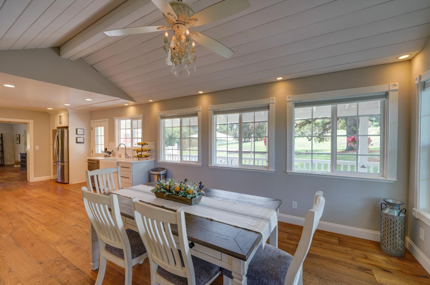 8495 Pharmer Road Gilroy, CA 95020 - Photo 16 of 70 a dining room with furniture a chandelier and wooden floor