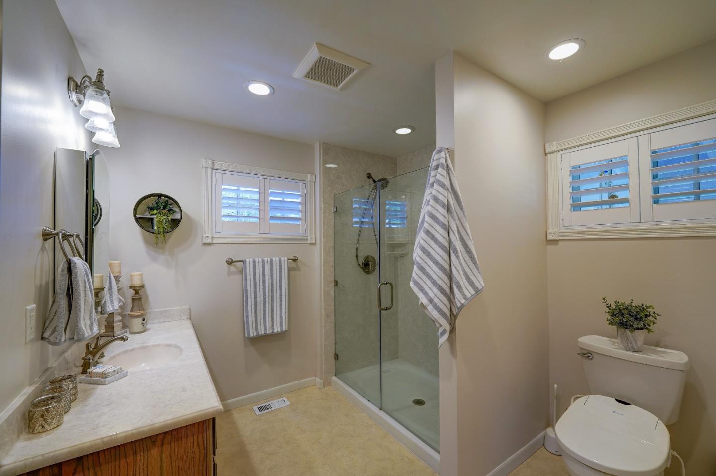8495 Pharmer Road Gilroy, CA 95020 - Photo 20 of 70 a bathroom with a sink a toilet and shower