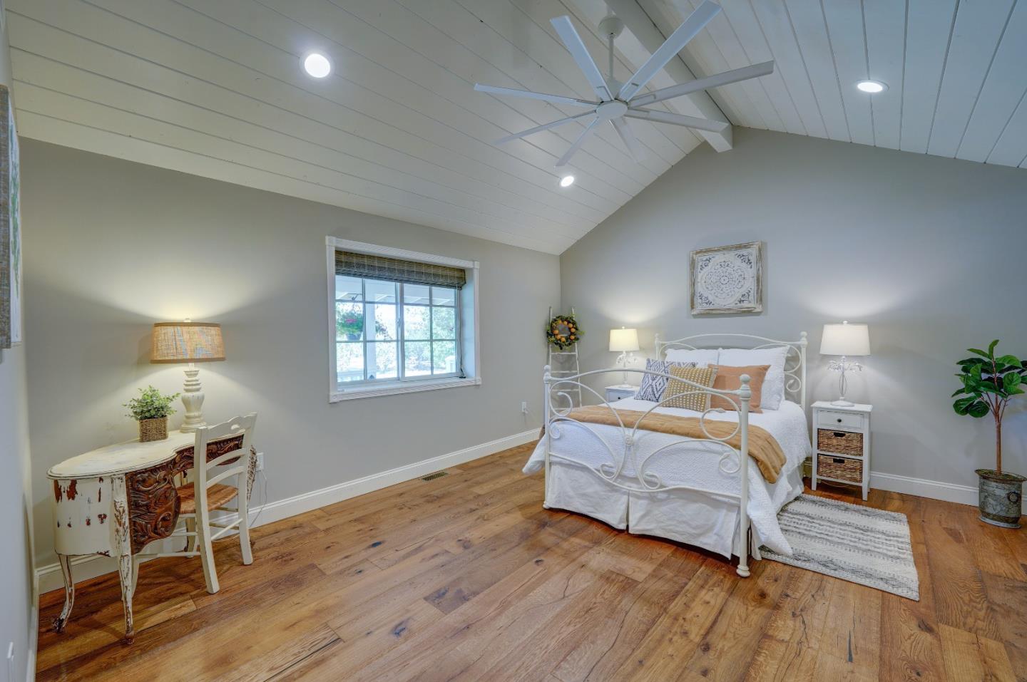 8495 Pharmer Road Gilroy, CA 95020 - Photo 21 of 70 a bedroom with a bed and a table in it