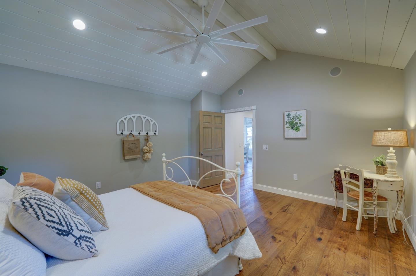 8495 Pharmer Road Gilroy, CA 95020 - Photo 22 of 70 a bedroom with a bed and a chair