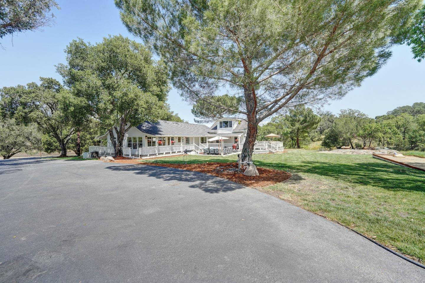 8495 Pharmer Road Gilroy, CA 95020 - Photo 33 of 70 a view of road with trees and a big yard