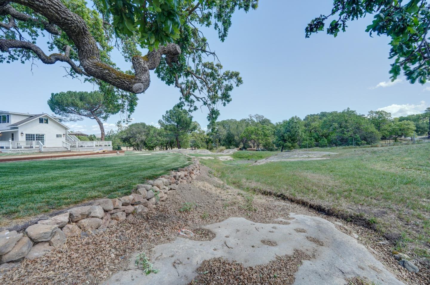 8495 Pharmer Road Gilroy, CA 95020 - Photo 37 of 70 a view of a backyard with large trees