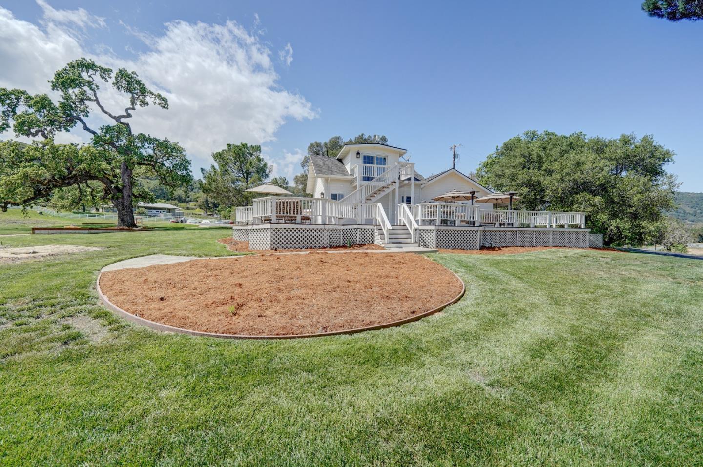 8495 Pharmer Road Gilroy, CA 95020 - Photo 41 of 70 a view of a swimming pool with a big yard and large trees