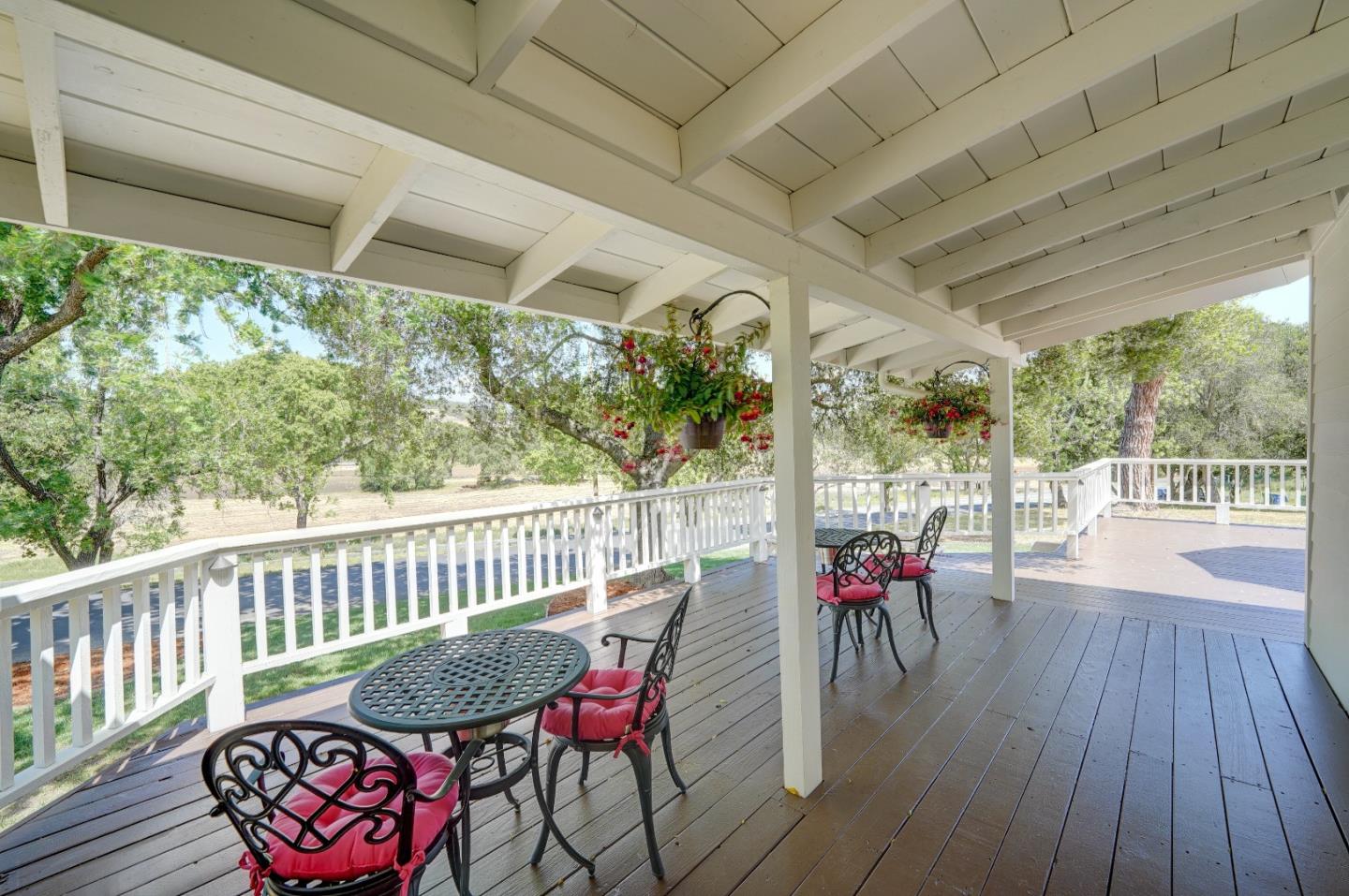8495 Pharmer Road Gilroy, CA 95020 - Photo 43 of 70 a view of a porch with furniture and wooden floor