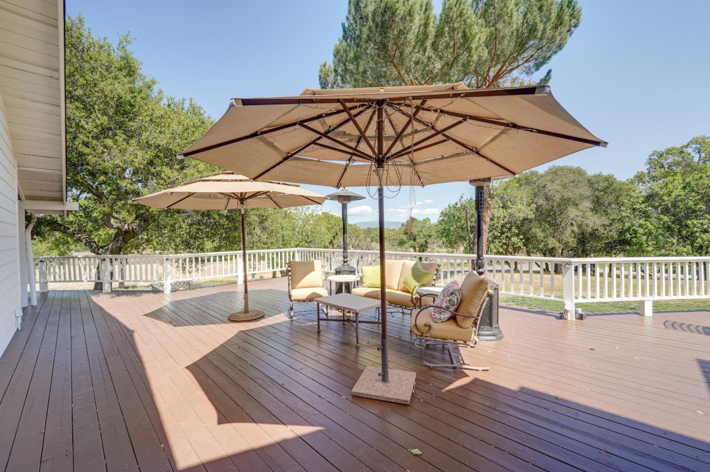 8495 Pharmer Road Gilroy, CA 95020 - Photo 46 of 70 a view of deck with furniture and umbrella