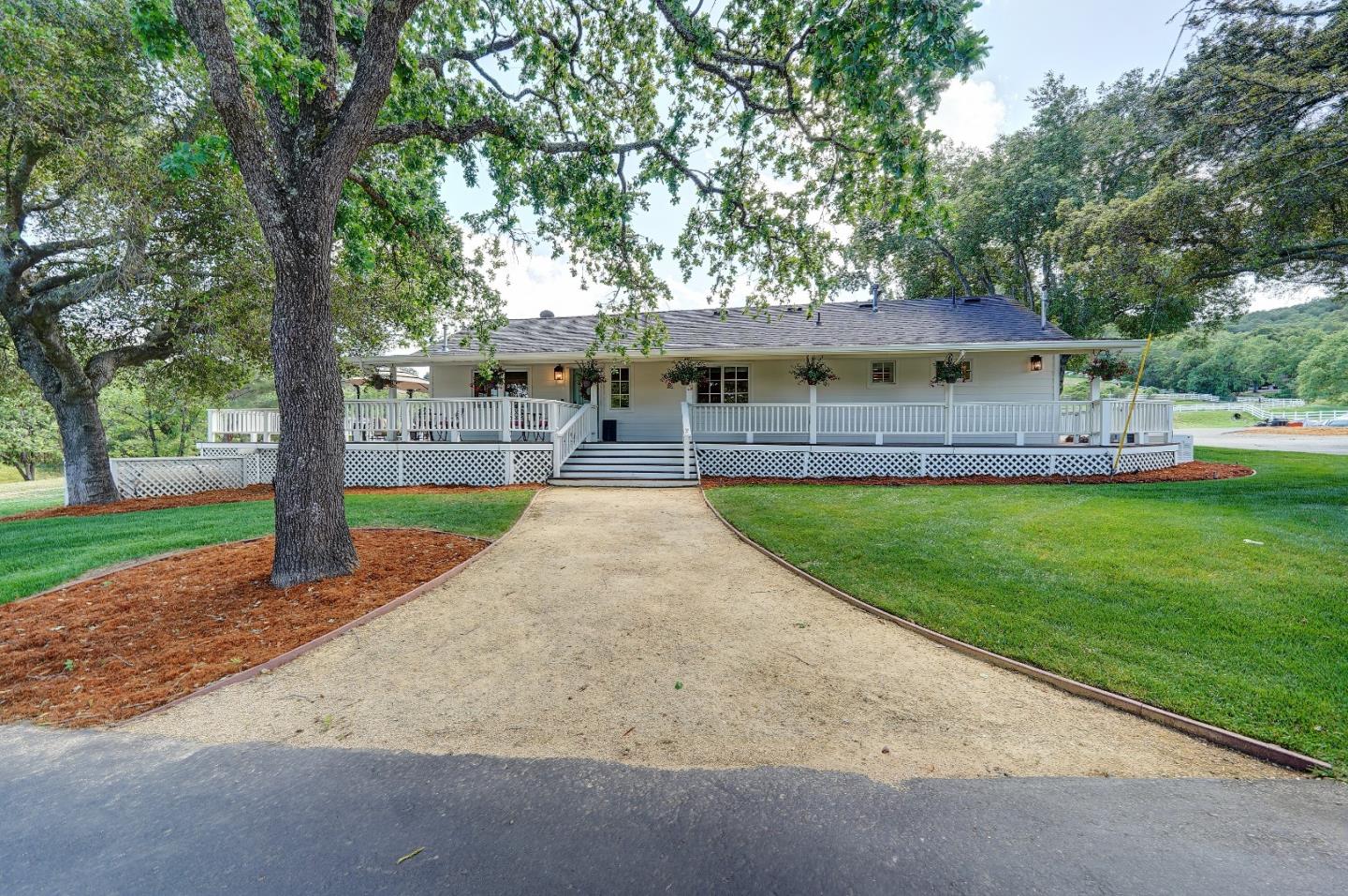 8495 Pharmer Road Gilroy, CA 95020 - Photo 5 of 70 a front view of house with yard and green space