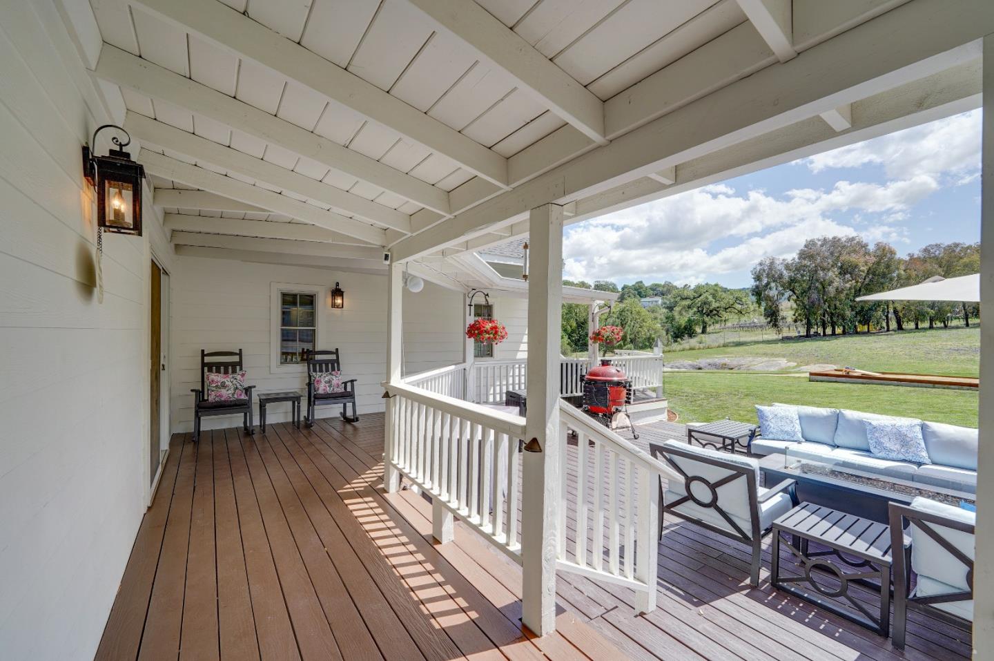 8495 Pharmer Road Gilroy, CA 95020 - Photo 51 of 70 a view of a patio with wooden floor and outdoor seating