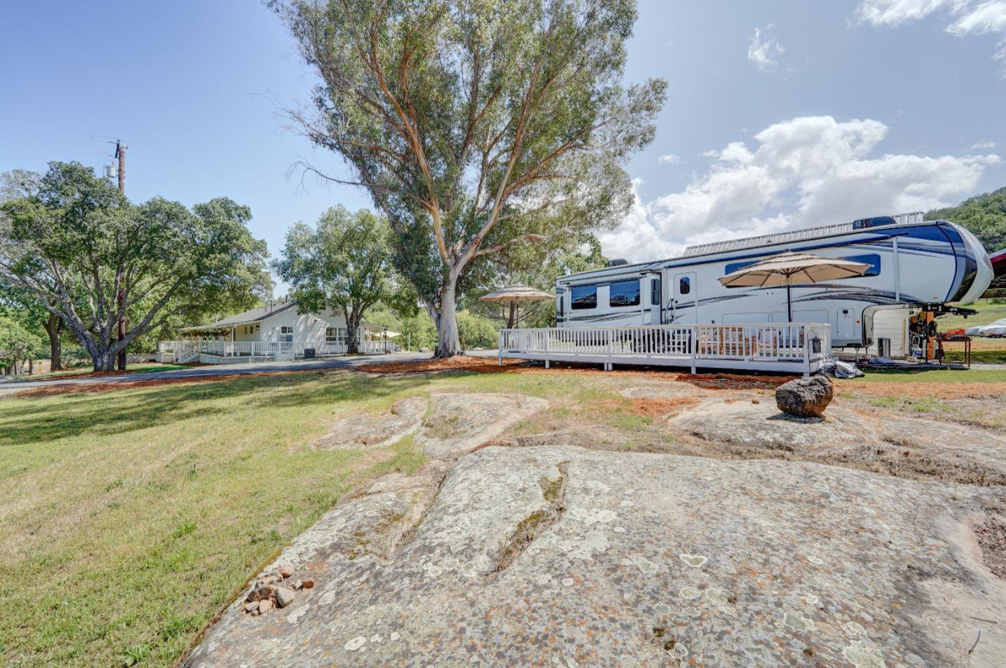 8495 Pharmer Road Gilroy, CA 95020 - Photo 62 of 70 a view of swimming pool with outdoor seating and house in the background