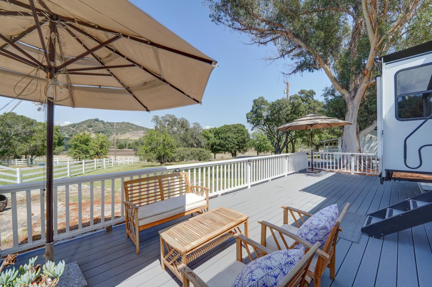 8495 Pharmer Road Gilroy, CA 95020 - Photo 64 of 70 a view of a patio with wooden floor table and chairs