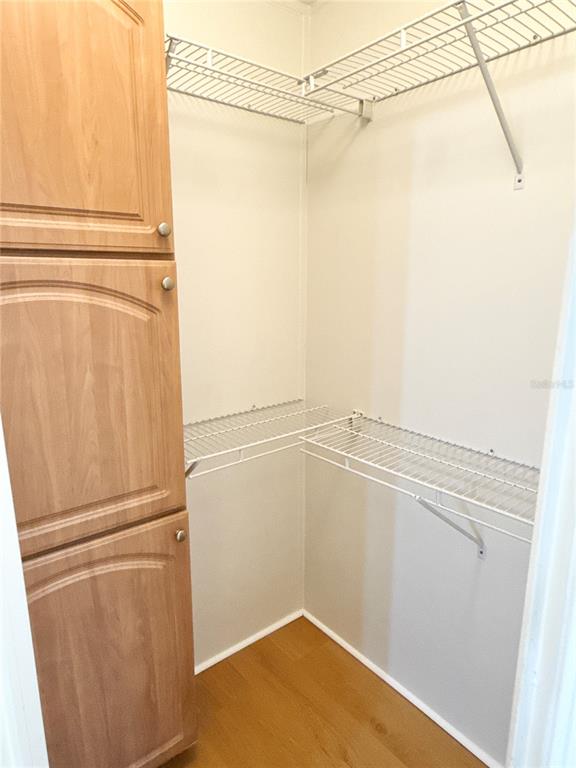 6817 Mt Pleasant Road Northeast, Unit 49 St. Petersburg, FL 33702 - Photo 22 of 30 a view of a room with racks on the wall