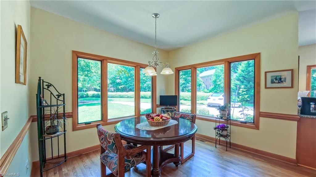 910 Whitney Court High Point, NC 27265 - Photo 6 of 24 A breakfast room off the kitchen invites casual meals and kitchen conversation.