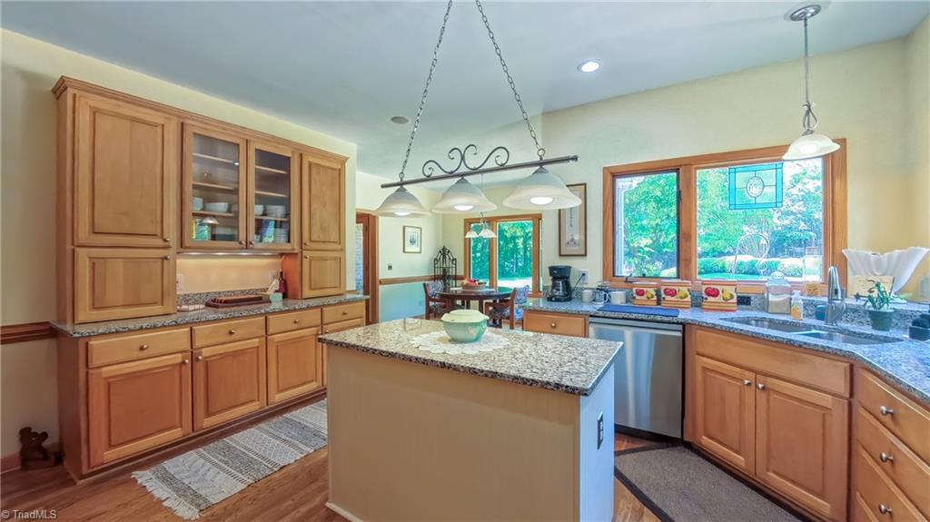 910 Whitney Court High Point, NC 27265 - Photo 9 of 24 A buffet compliments the already gracious kitchen.