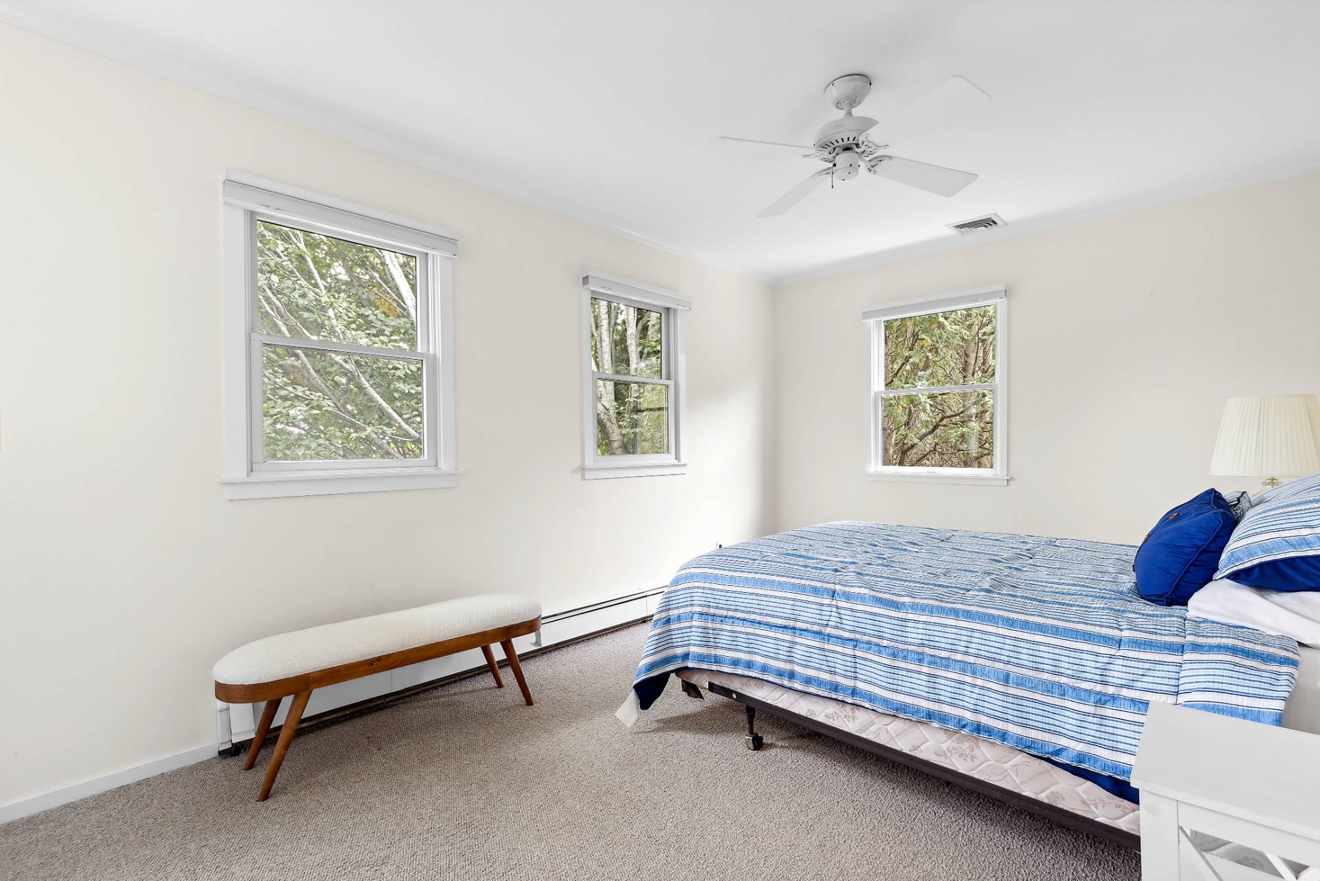 573 North Sea Mecox Road Southampton, NY 11968 - Photo 15 of 21 a bedroom with a bed and a window