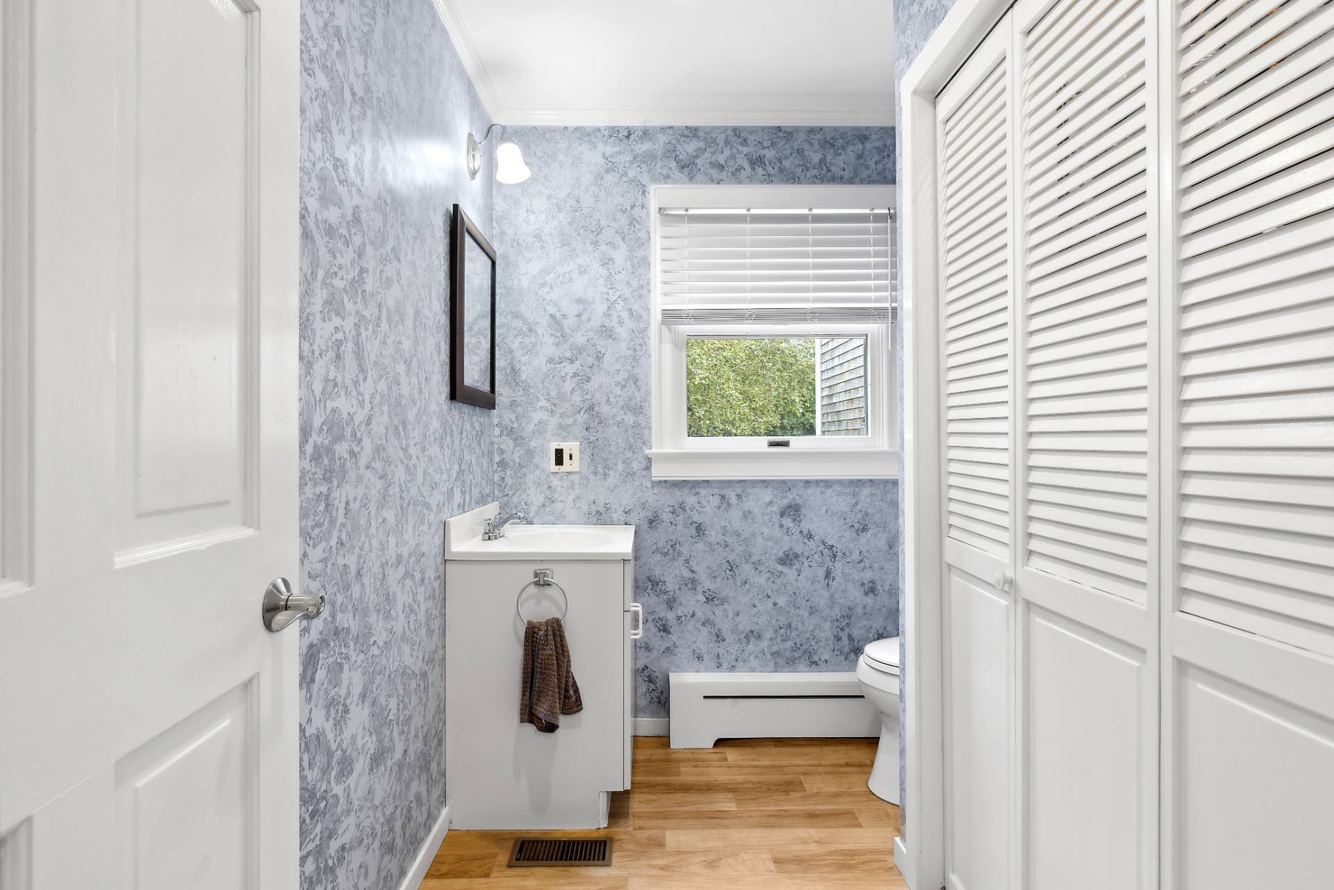 573 North Sea Mecox Road Southampton, NY 11968 - Photo 17 of 21 a bathroom with a sink and mirror