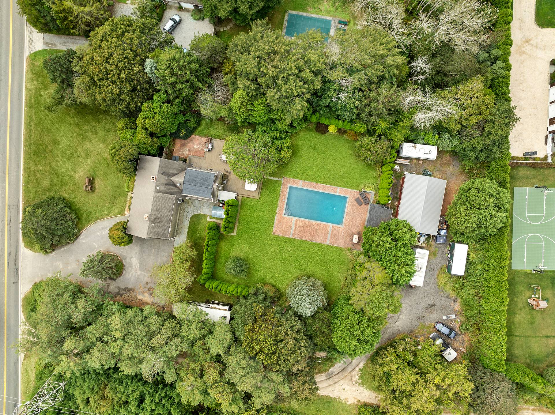 573 North Sea Mecox Road Southampton, NY 11968 - Photo 20 of 21 an aerial view of residential house with outdoor space and trees all around