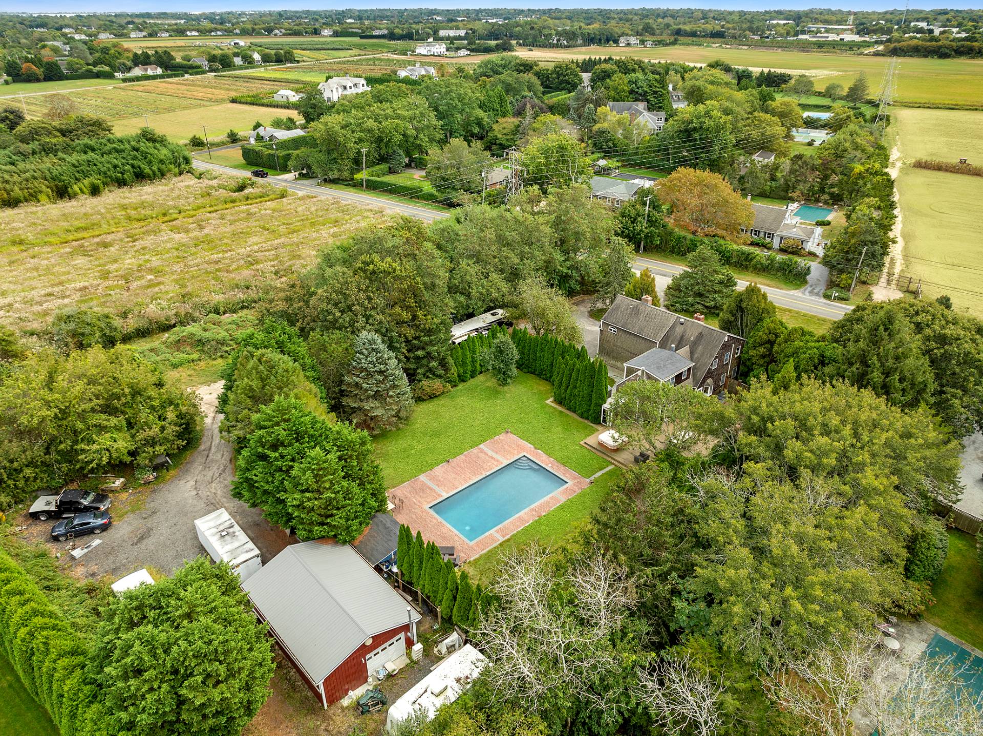 573 North Sea Mecox Road Southampton, NY 11968 - Photo 21 of 21 an aerial view of residential house with pool and outdoor space