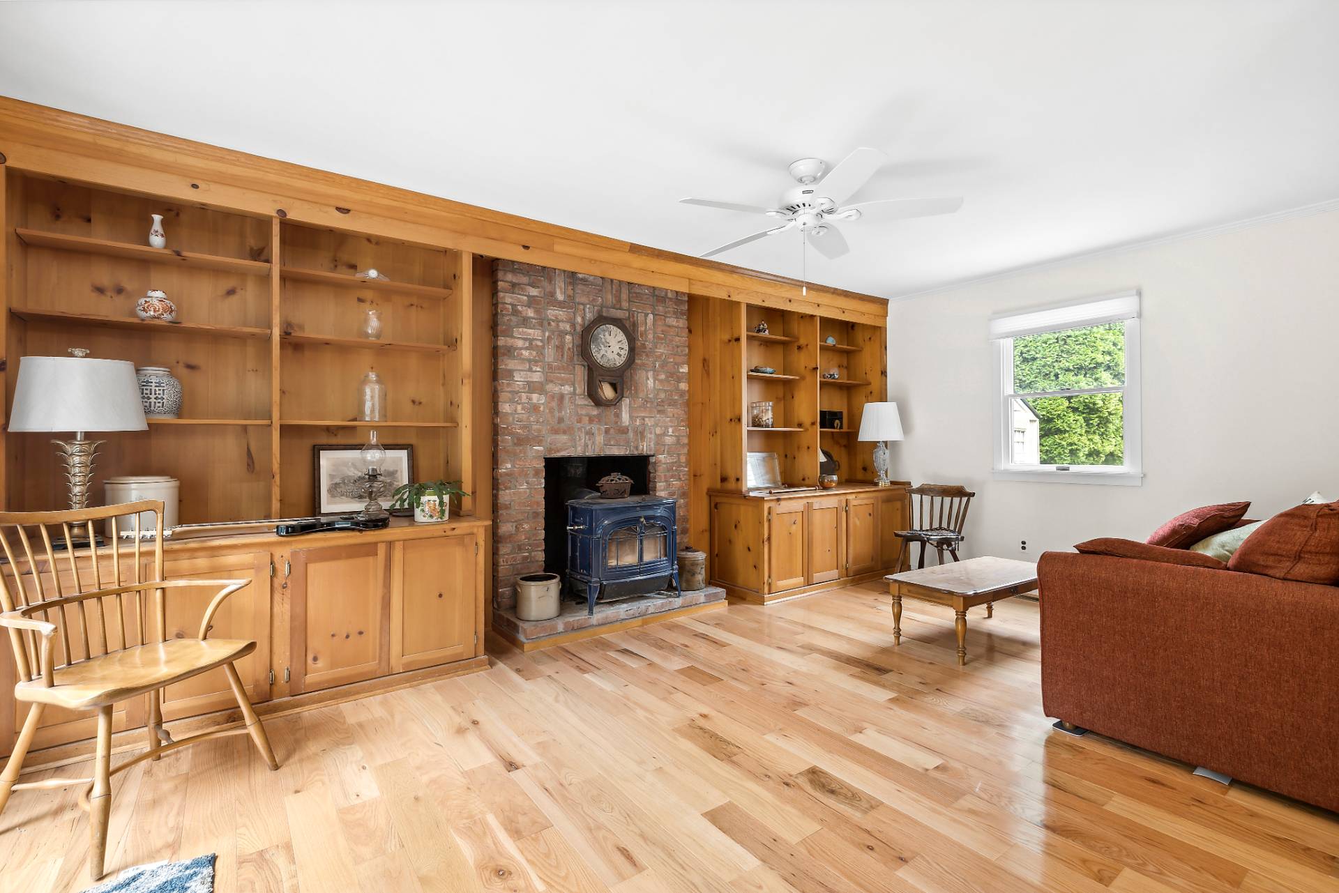 573 North Sea Mecox Road Southampton, NY 11968 - Photo 5 of 21 a living room with furniture a fireplace and a flat screen tv