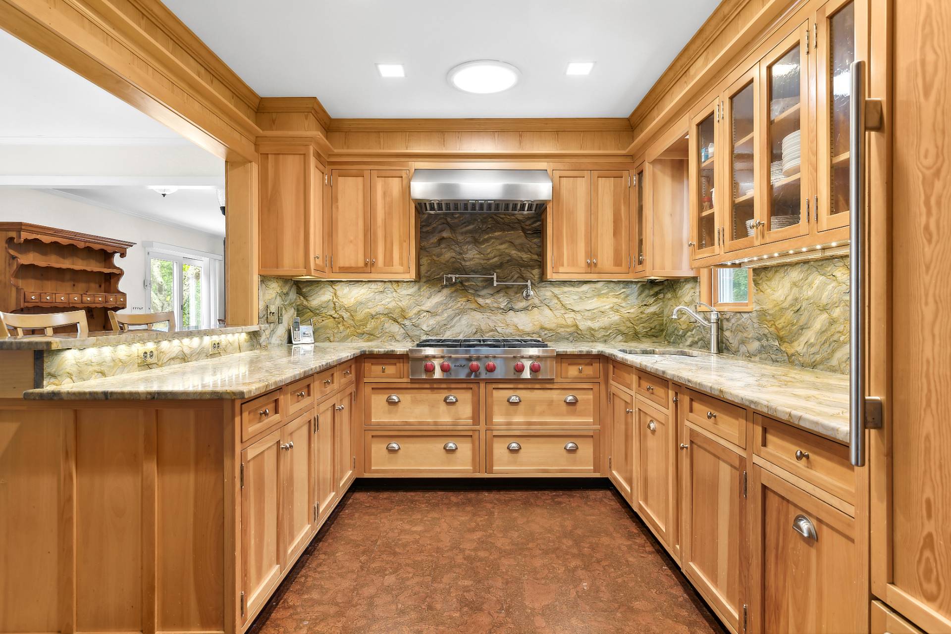 573 North Sea Mecox Road Southampton, NY 11968 - Photo 8 of 21 a kitchen with stainless steel appliances granite countertop a sink and cabinets
