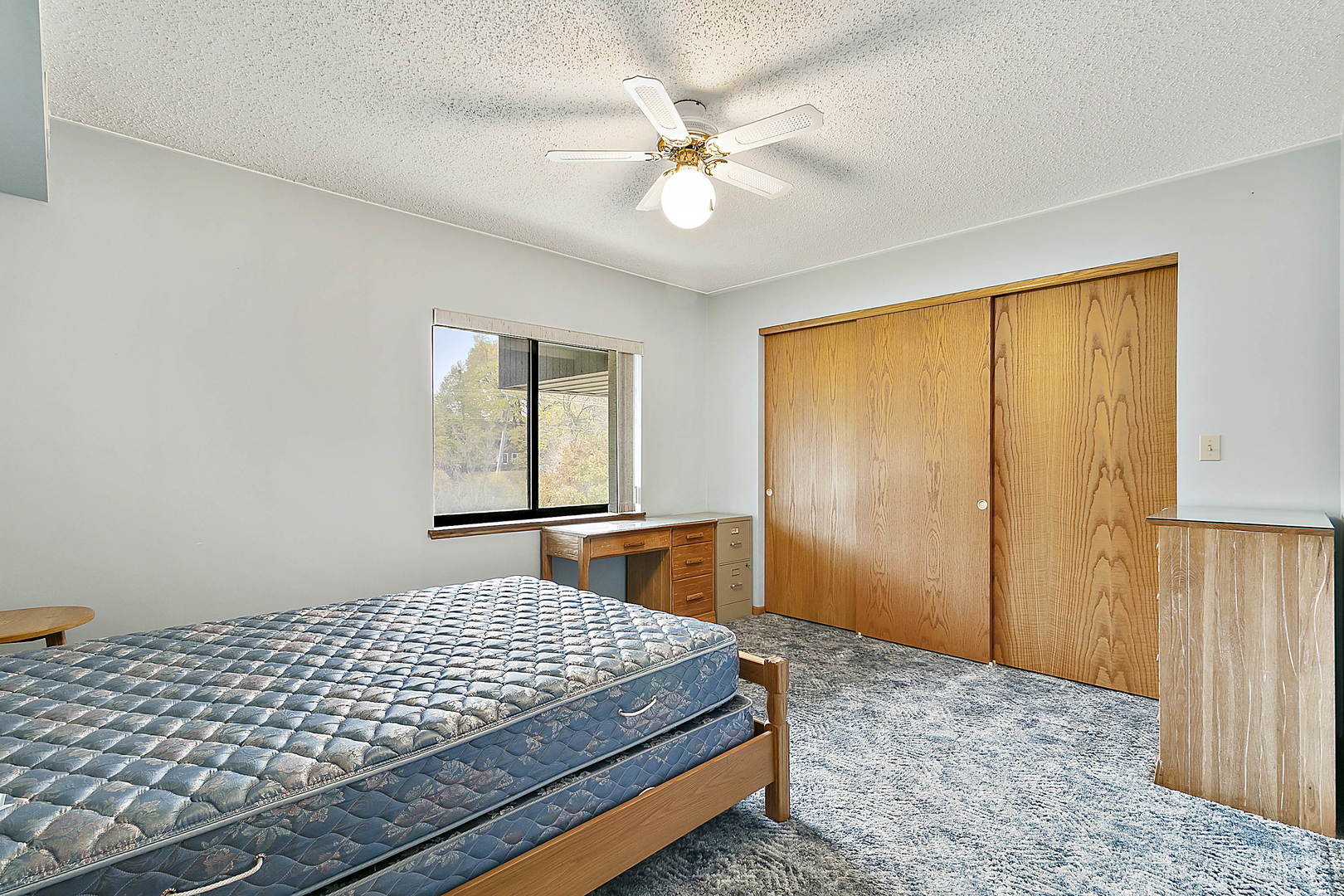 937 East Division Street, Unit 2D Lockport, IL 60441 - Photo 11 of 18 a bedroom with a bed and window