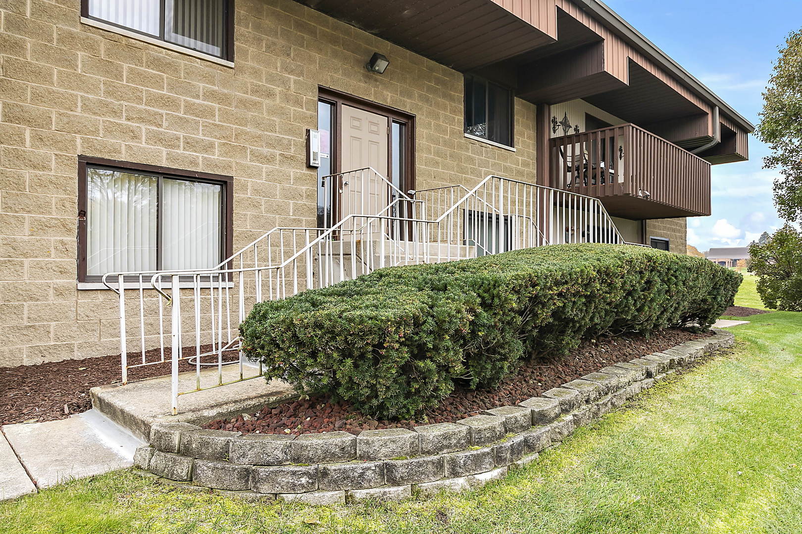 937 East Division Street, Unit 2D Lockport, IL 60441 - Photo 3 of 18 a view of a house with a porch