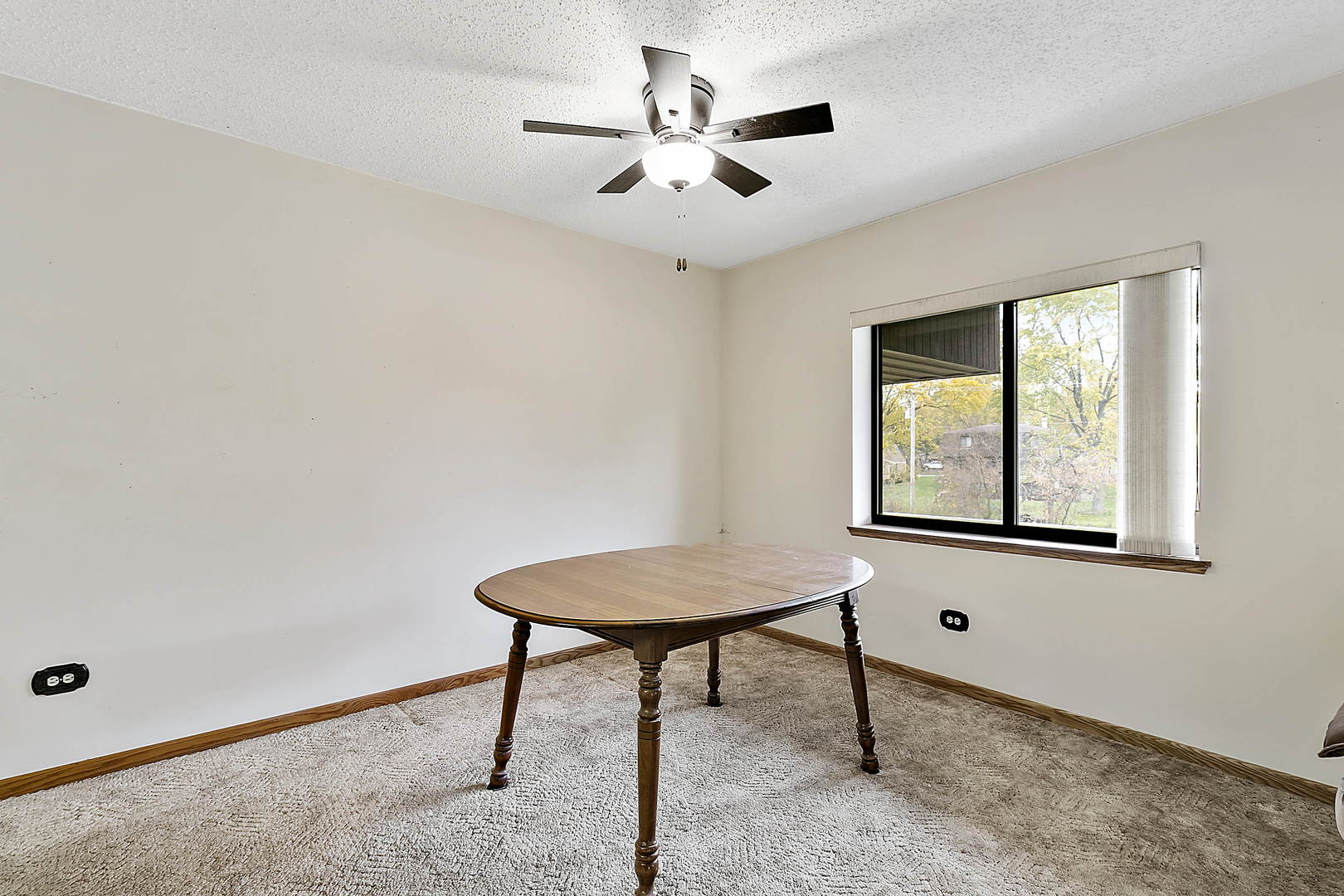 937 East Division Street, Unit 2D Lockport, IL 60441 - Photo 8 of 18 a view of a workspace with furniture and a window