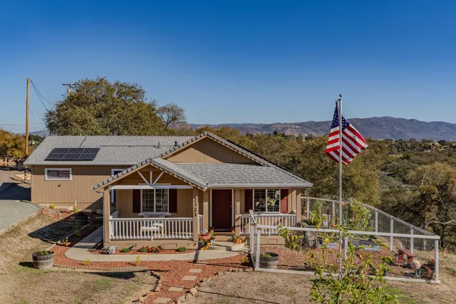 a front view of a house with a porch