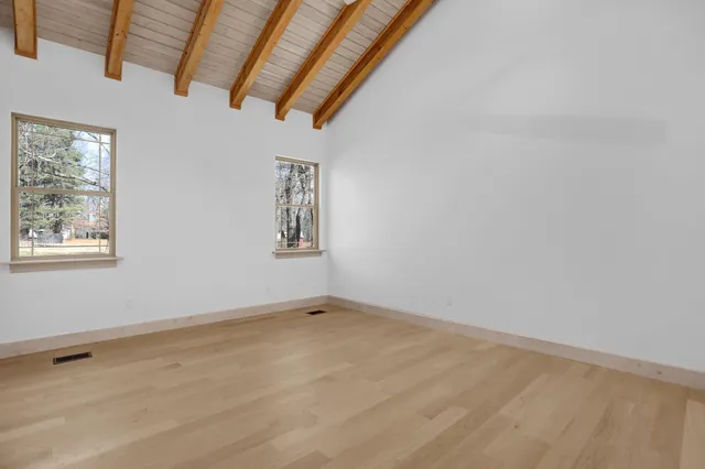 a view of room with window and stairs