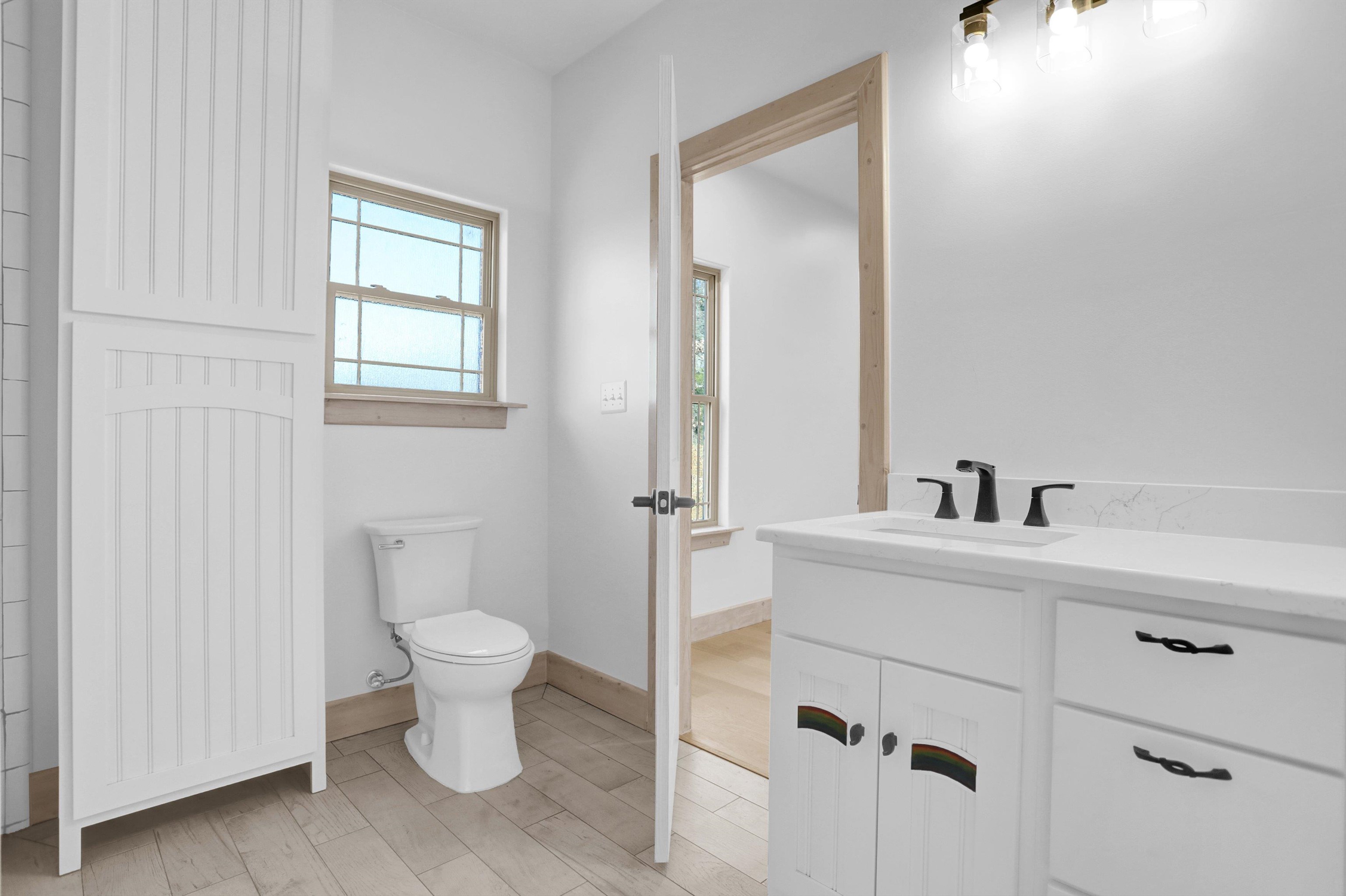 3 East Cherry Street Stanton, TN 38069 - Photo 21 of 33 a bathroom with a toilet sink and a mirror