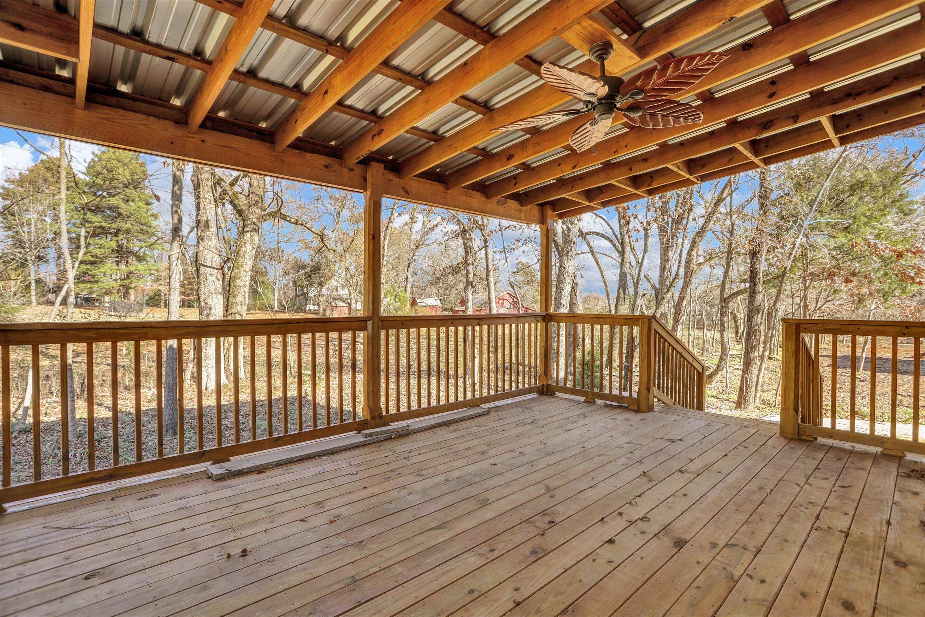 3 East Cherry Street Stanton, TN 38069 - Photo 29 of 33 a view of porch with wooden floor