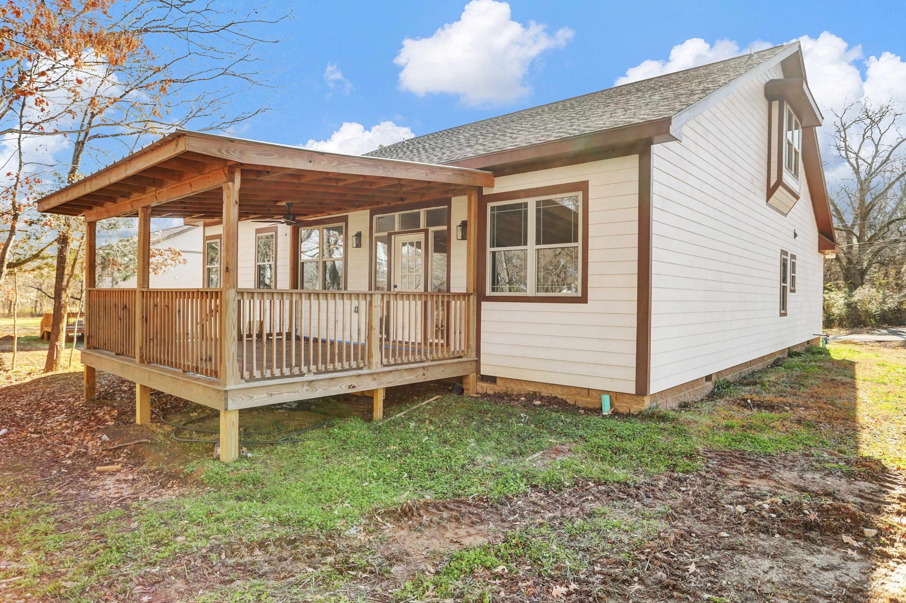 3 East Cherry Street Stanton, TN 38069 - Photo 31 of 33 a view of a house with a yard and deck