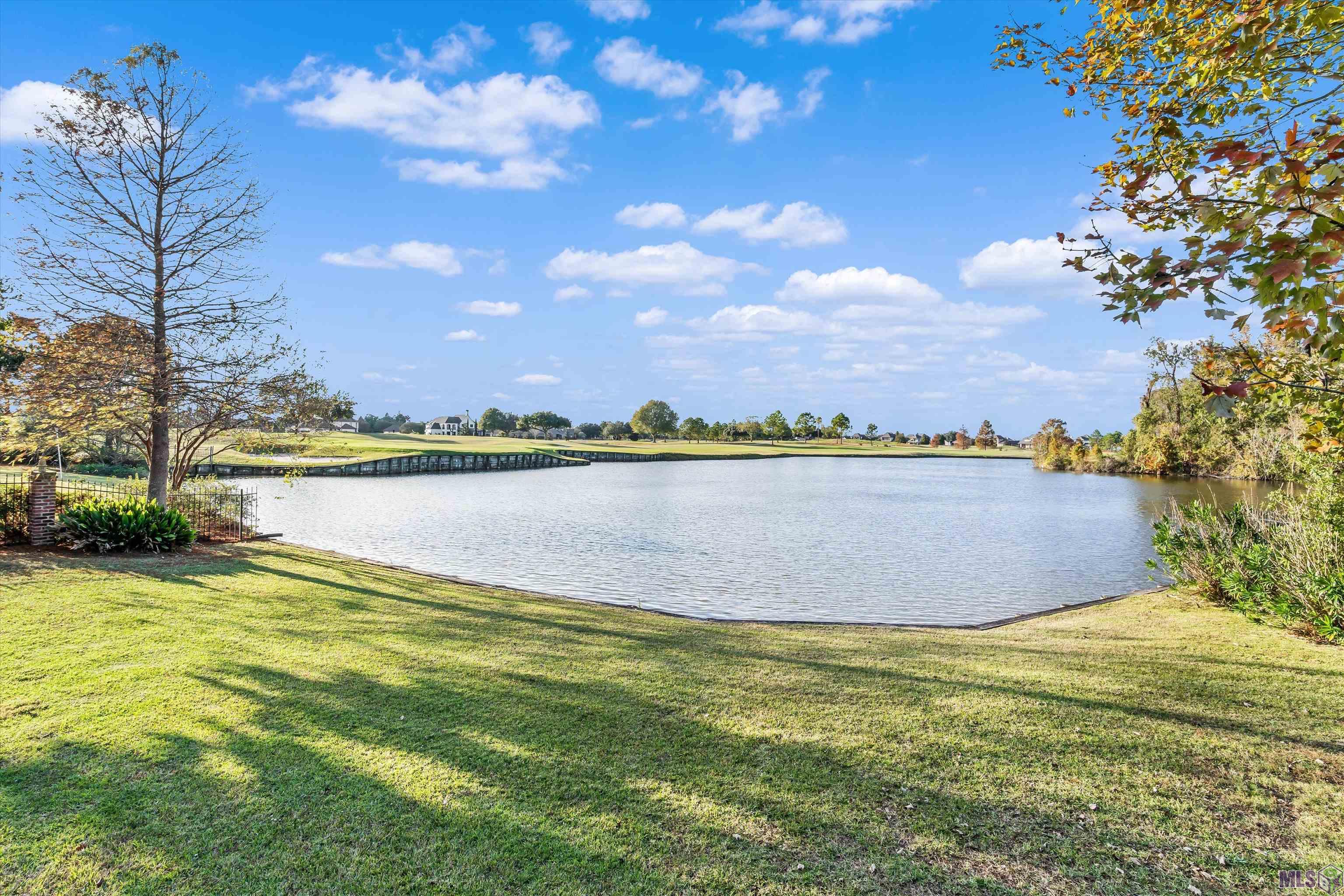 3128 Tradition Avenue Baton Rouge, LA 70810 - Photo 41 of 44 18TH HOLE AND LAKE