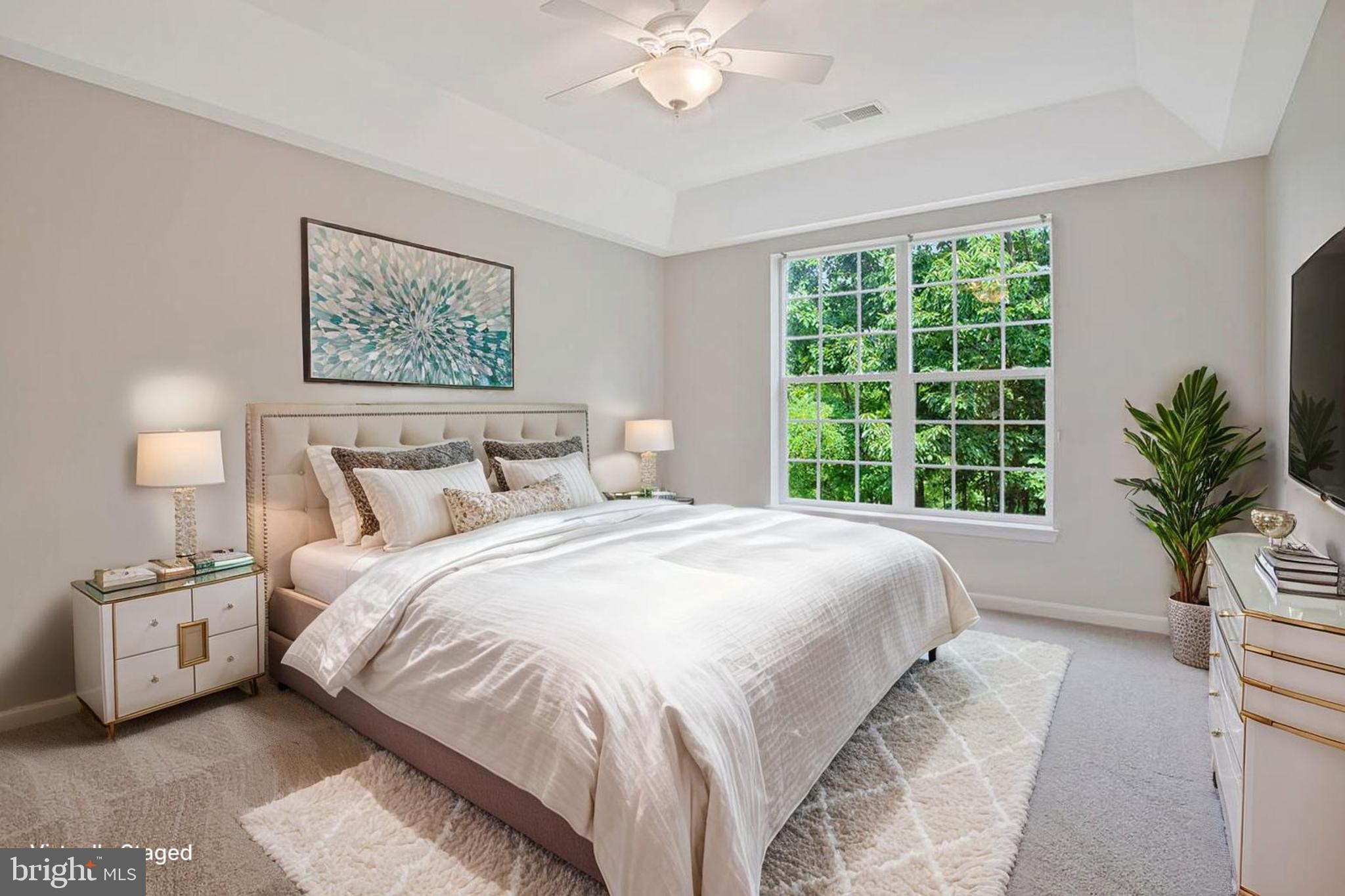 7305 Maplecrest Road, Unit 206 Elkridge, MD 21075 - Photo 21 of 62 a bedroom with a large bed and a window