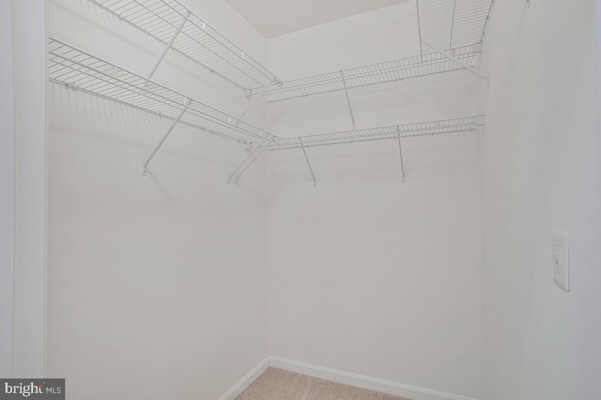 7305 Maplecrest Road, Unit 206 Elkridge, MD 21075 - Photo 24 of 62 a view of a rack on the wall