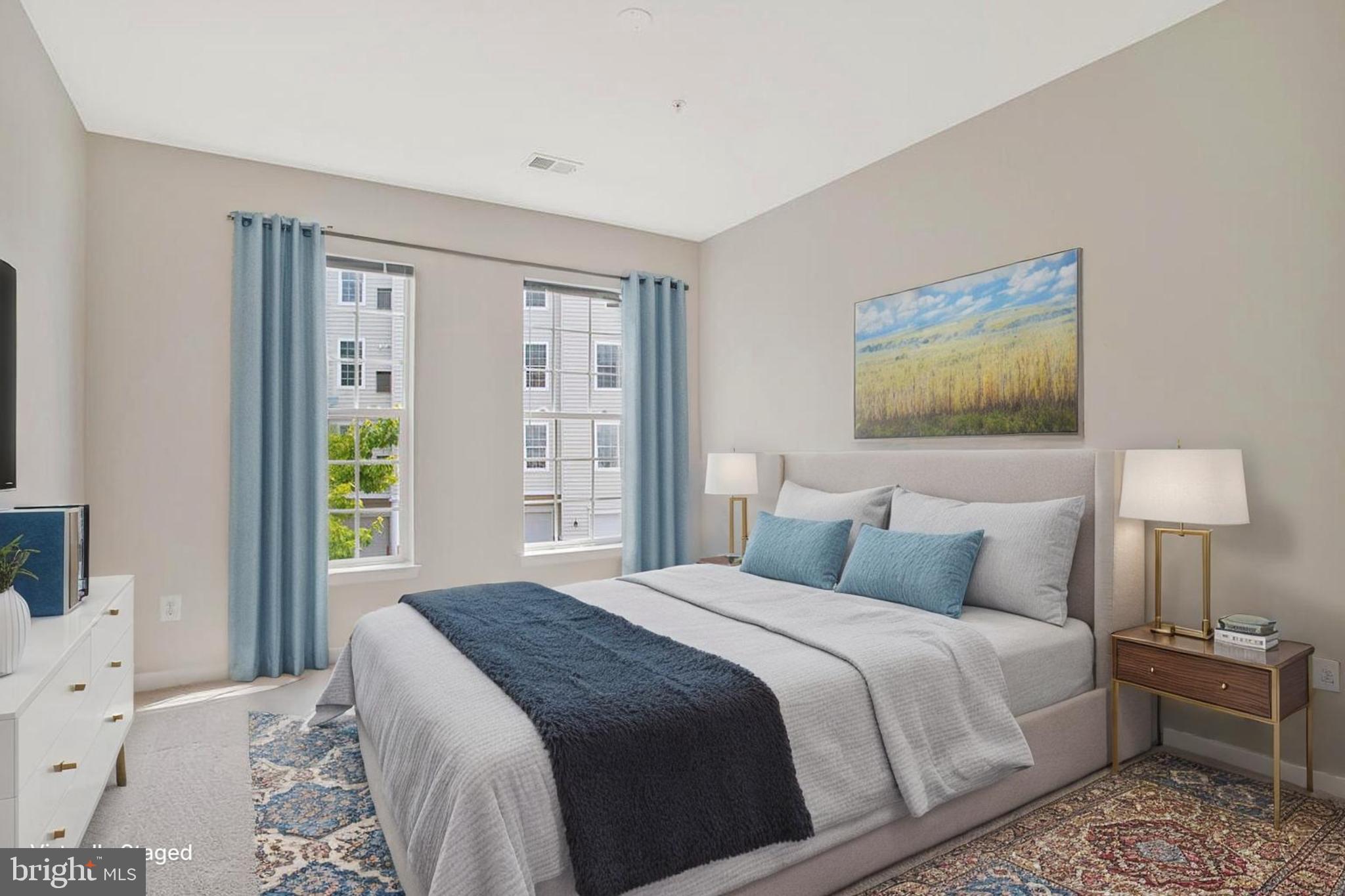 7305 Maplecrest Road, Unit 206 Elkridge, MD 21075 - Photo 26 of 62 a bedroom with a bed and a window