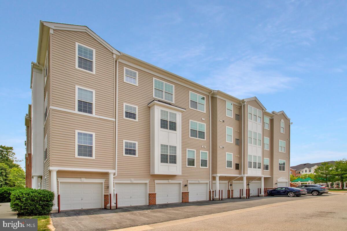 7305 Maplecrest Road, Unit 206 Elkridge, MD 21075 - Photo 32 of 62 a front view of a building with street view