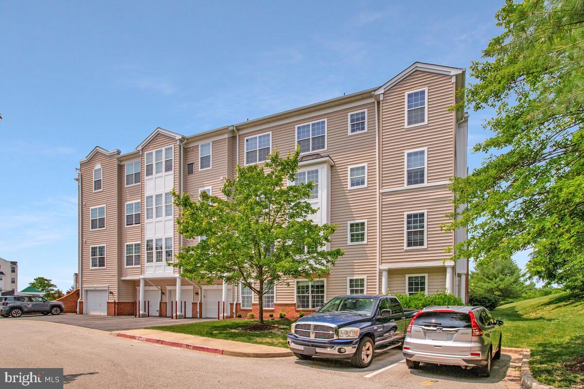 7305 Maplecrest Road, Unit 206 Elkridge, MD 21075 - Photo 33 of 62 a car parked in front of a building