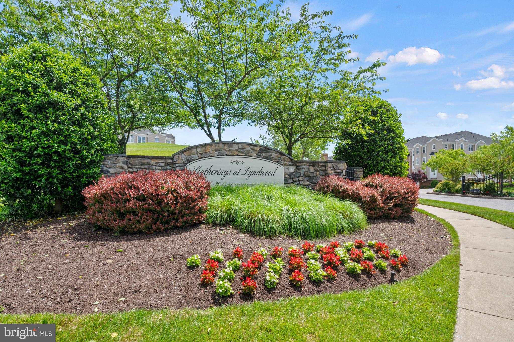 7305 Maplecrest Road, Unit 206 Elkridge, MD 21075 - Photo 38 of 62 a view of a garden with plants and outdoor seating