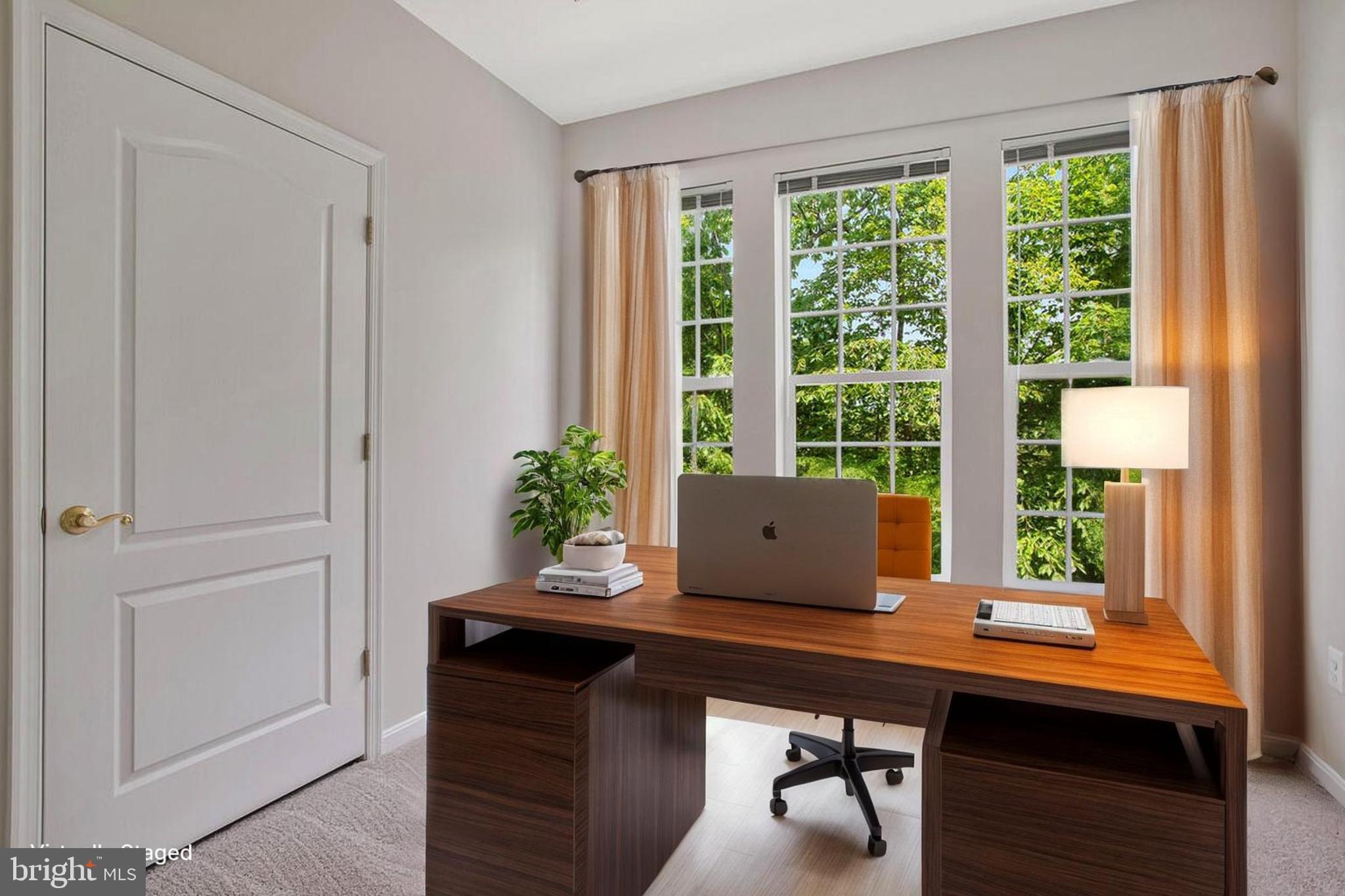 7305 Maplecrest Road, Unit 206 Elkridge, MD 21075 - Photo 10 of 62 a view of room with a large window and wooden floor