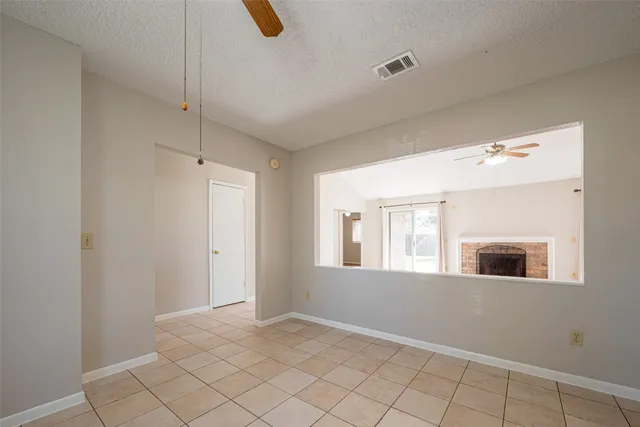 a view of an empty room with window