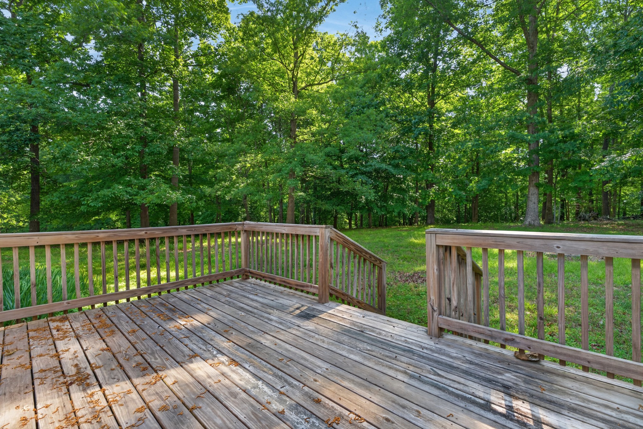228 Shasteen Ridge Road Lynchburg, TN 37352 - Photo 44 of 53 a view of balcony with wooden floor and fence
