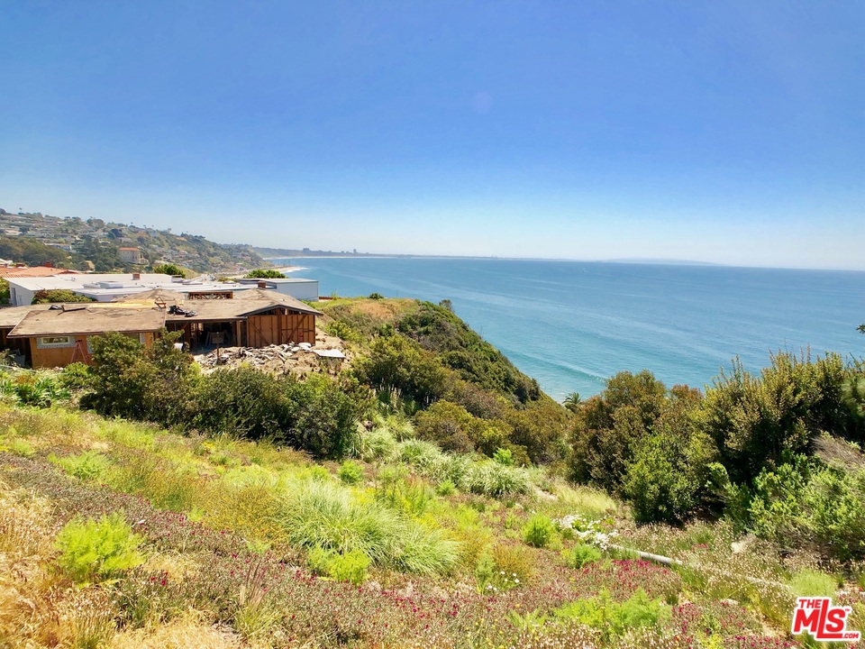 18325 Coastline Drive Malibu, CA 90265 - Photo 20 of 20 a view of a lake with a city