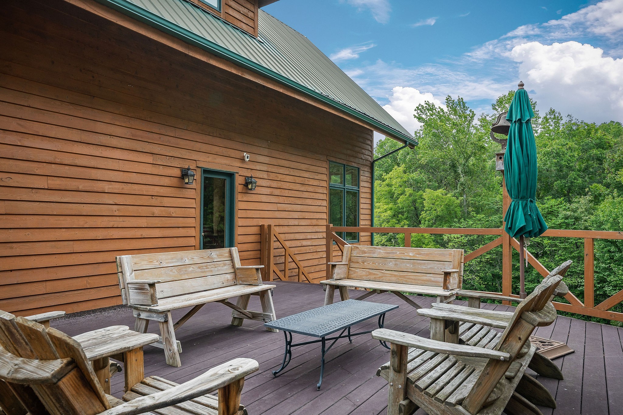 4042 Rocky Ridge Road Doyle, TN 38559 - Photo 11 of 85 a view of a patio with a table and chairs