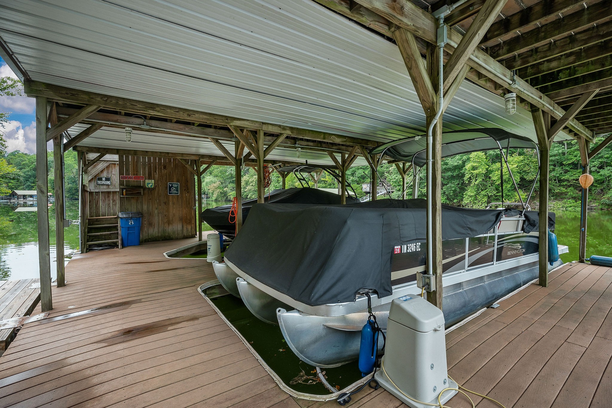 4042 Rocky Ridge Road Doyle, TN 38559 - Photo 15 of 85 a view of a balcony with chairs and wooden floor