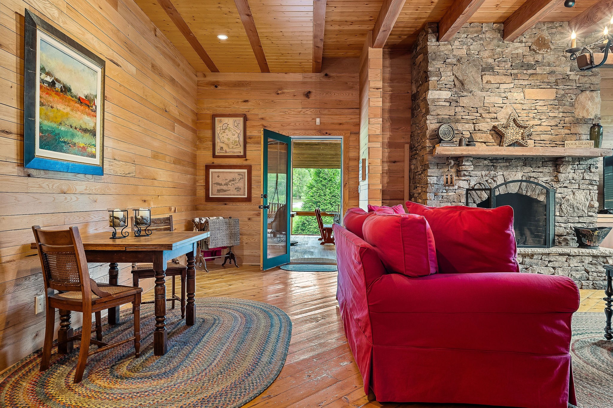 4042 Rocky Ridge Road Doyle, TN 38559 - Photo 26 of 85 a living room with furniture a fireplace and wooden floor