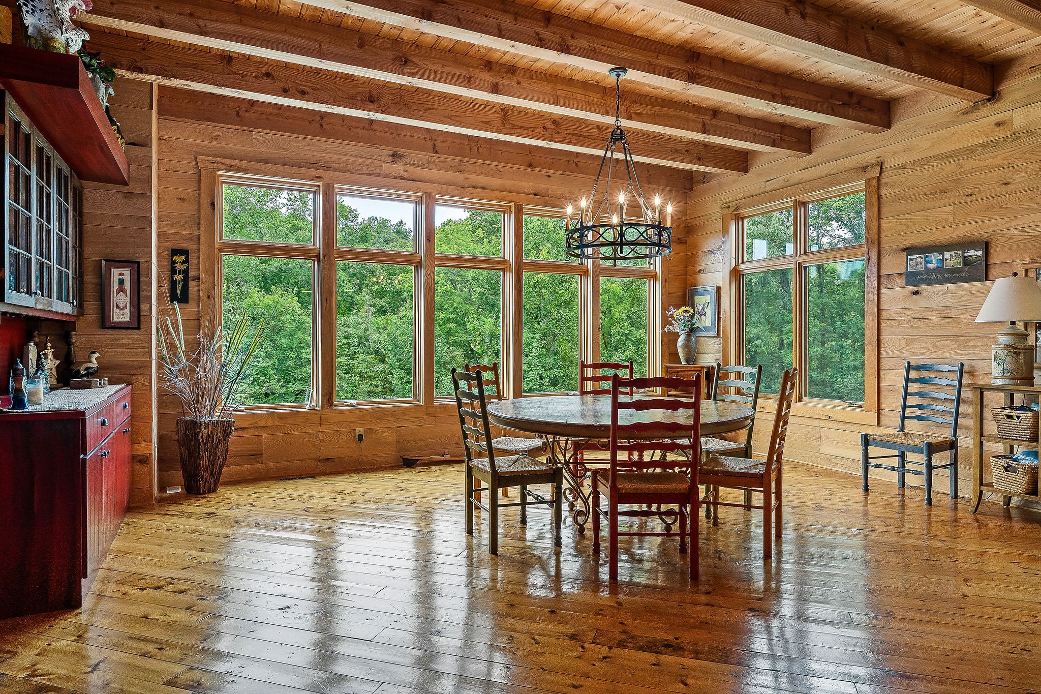 4042 Rocky Ridge Road Doyle, TN 38559 - Photo 34 of 85 a view of a dining room with furniture window and wooden floor