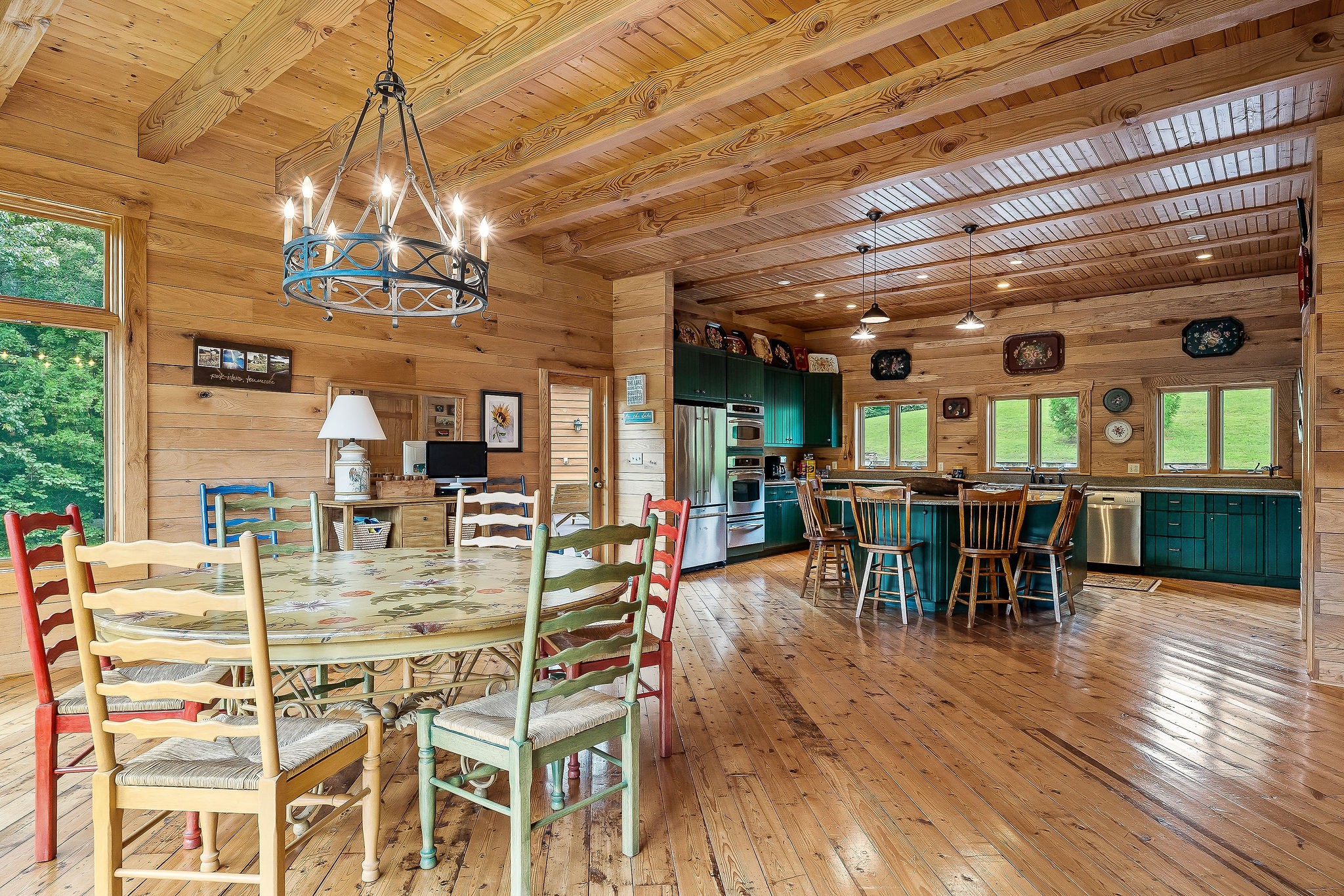 4042 Rocky Ridge Road Doyle, TN 38559 - Photo 37 of 85 a view of a dining room with furniture window and wooden floor