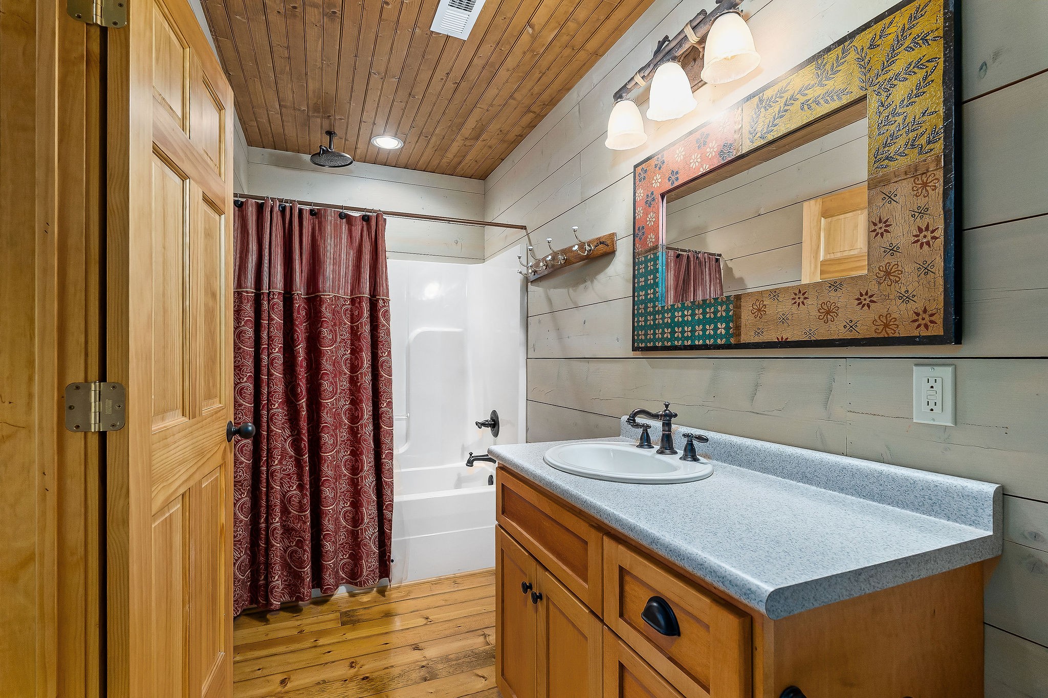4042 Rocky Ridge Road Doyle, TN 38559 - Photo 51 of 85 a bathroom with a sink and a mirror